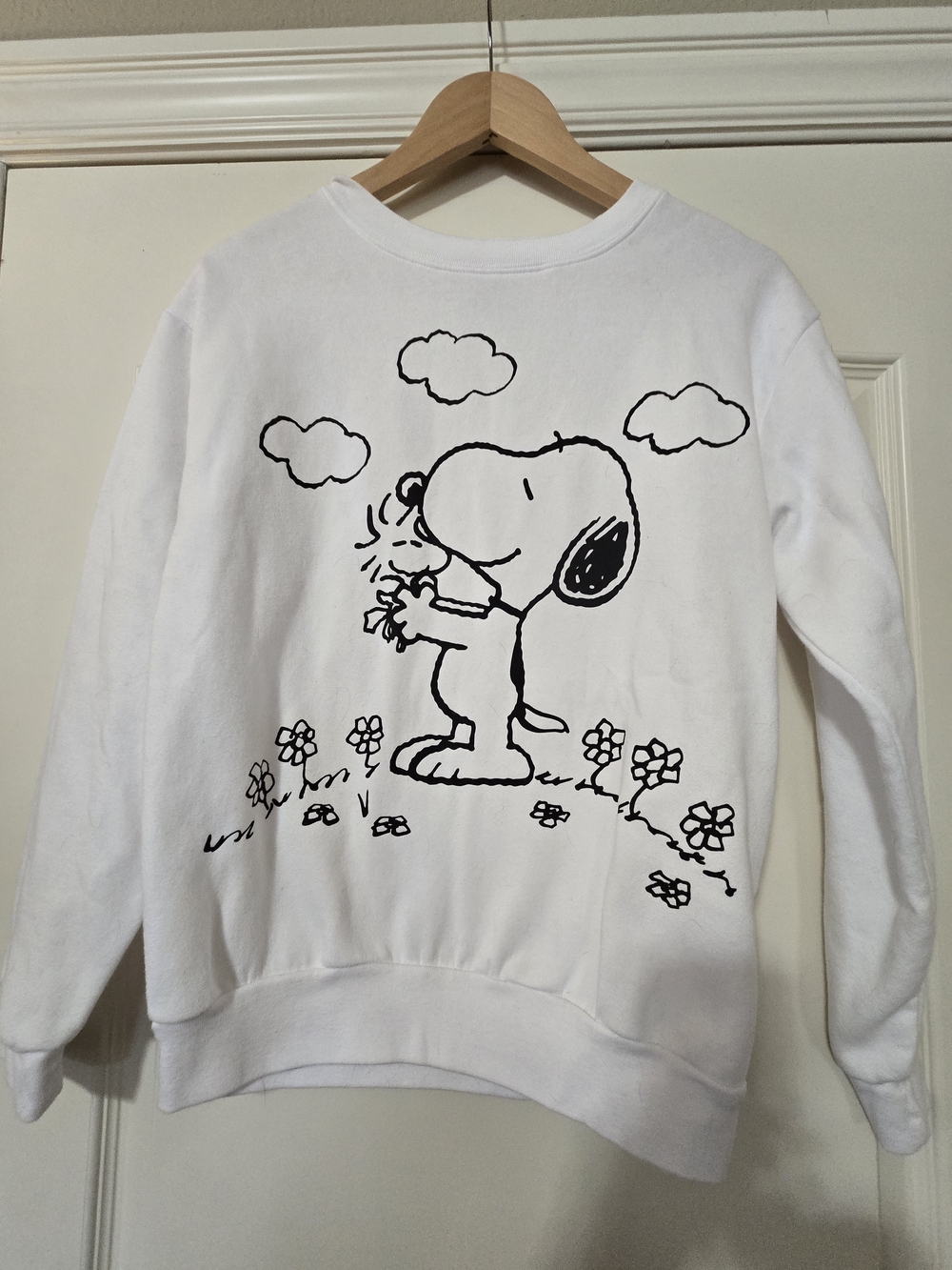 Peanuts White Sweatshirt with Black Snoopy Illustration